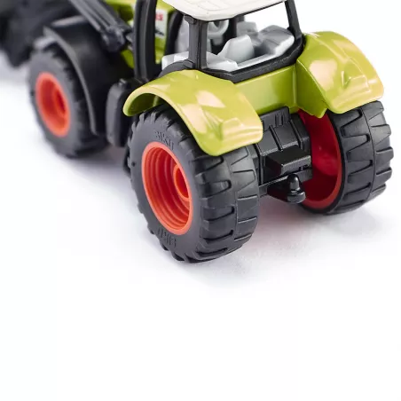 Tractor de juguete Claas Axion con pala cargadora delantera de metal y plástico resistente.