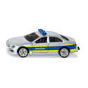 Juguete de patrulla de policía de metal y plástico con puertas que se abren y enganche para acoplar.