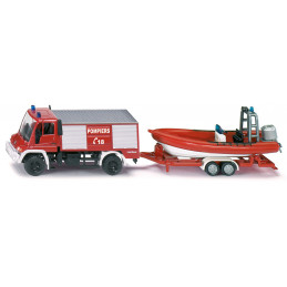 Camión de bomberos Unimog de juguete con remolque y barco flotante de metal y plástico.