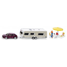 Coche Porsche Macan Turbo de juguete con caravana Dethleffs Siku en miniatura.