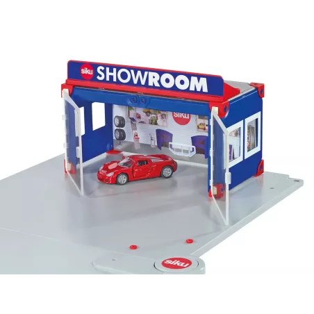 Concesionario de coches de juguete Siku con Porsche Carrera GT en podio giratorio.