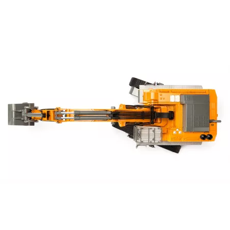 Excavadora teledirigida Liebherr R980 RC a escala 1:32 con brazo móvil y chasis de orugas.