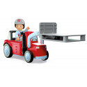 Juguete de granja Willy Worky con tractor cargador modular, figura articulada de granjero y accesorios de juego.