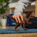 Figura de dinosaurio Allosaurus de Schleich con mandíbula articulada y diseño realista.