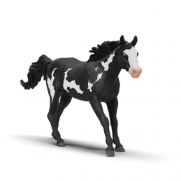 Figura detallada de caballo capón Paint Horse de Schleich pintada a mano con manchas realistas.