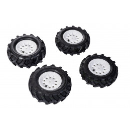 Set de cuatro neumáticos de aire rollyTrac para tractores de pedales infantiles que mejoran la tracción.