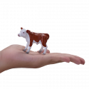 Ternero Hereford de juguete Mojo pintado a mano con gran realismo para juego educativo.