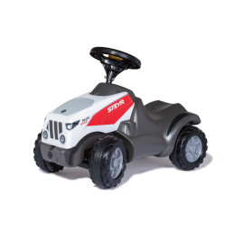 Tractor correpasillos rollyMinitrac Steyr Plus 4120 de Rolly Toys con capó abatible para niños.
