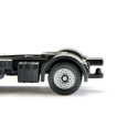 Camión de juguete MAN con retroexcavadora SIKU a escala 1:87 fabricado en metal y plástico