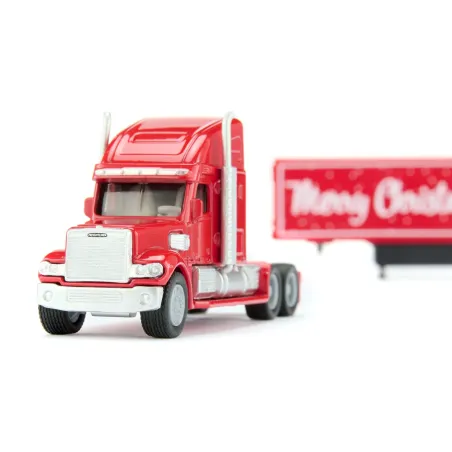 Camión navideño Freightliner SIKU escala 1:87 rojo con detalles cromados y motivos festivos de colección