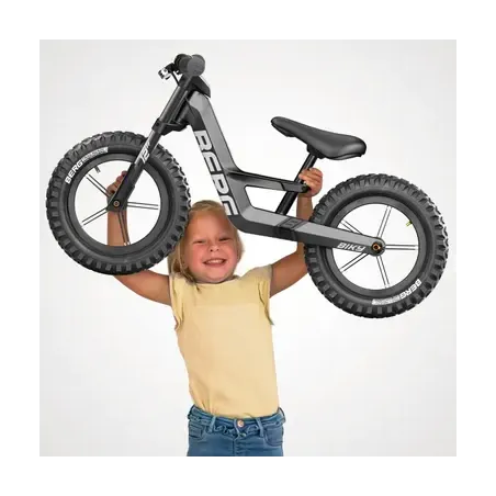 Bicicleta infantil BERG Bike Cross gris con freno de mano de alta precisión y diseño ergonómico ajustable.
