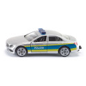Juguete de patrulla de policía de metal y plástico con puertas que se abren y enganche para acoplar.