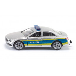 Juguete de patrulla de policía de metal y plástico con puertas que se abren y enganche para acoplar.