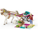 Coche de caballos de juguete Schleich Horse Club con poni Connemara, Clara y accesorios de pícnic.