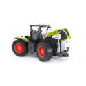 Tractor de juguete Claas Xerion 5000 de Bruder a escala 1:16 con cabina giratoria y neumáticos perfilados.