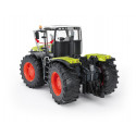 Tractor de juguete Claas Xerion 5000 de Bruder a escala 1:16 con cabina giratoria y neumáticos perfilados.