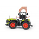 Tractor de juguete Claas Xerion 5000 de Bruder a escala 1:16 con cabina giratoria y neumáticos perfilados.