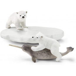 Tobogán de osos polares Schleich con figuras de oseznos y narval de juguete sobre témpano de hielo.
