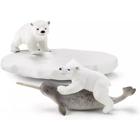Tobogán de osos polares Schleich con figuras de oseznos y narval de juguete sobre témpano de hielo.