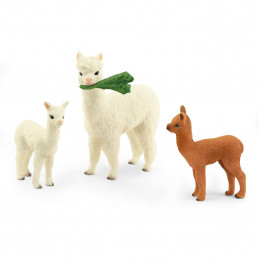Set de figuras de alpacas Schleich con una alpaca adulta, dos crías y un arbusto de juguete.