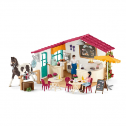 Cafetería de jinetes Schleich con terraza de juguete y figuras de caballos descansando.