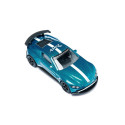 Miniatura de Aston Martin Vantage GT4 azul metálico con alerón trasero y llantas deportivas de competición.