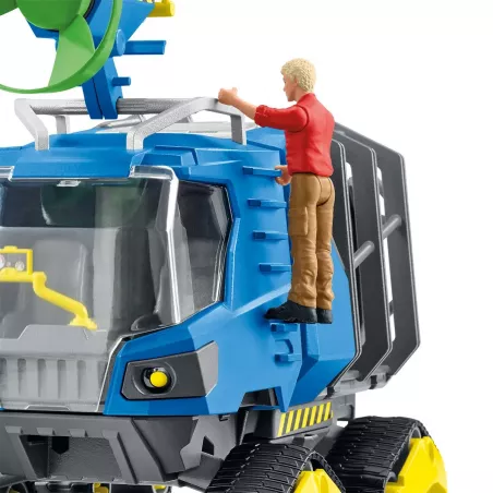 Vehículo oruga de juguete Schleich con cabina elevable y jaula de transporte para capturar dinosaurios.