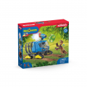 Vehículo oruga de juguete Schleich con cabina elevable y jaula de transporte para capturar dinosaurios.