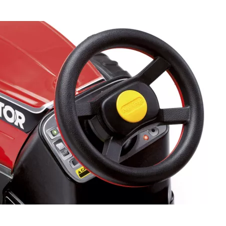 Tractor infantil a pedales Maxi Diesel Peg-Pérego con remolque desmontable.