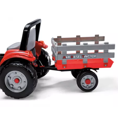 Tractor infantil a pedales Maxi Diesel Peg-Pérego con remolque desmontable.